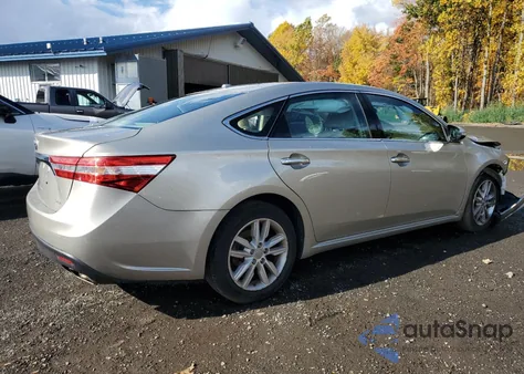 2014 Toyota Avalon Base z USA, uszkodzony, nr VIN 4T1BK1EB0EU085873